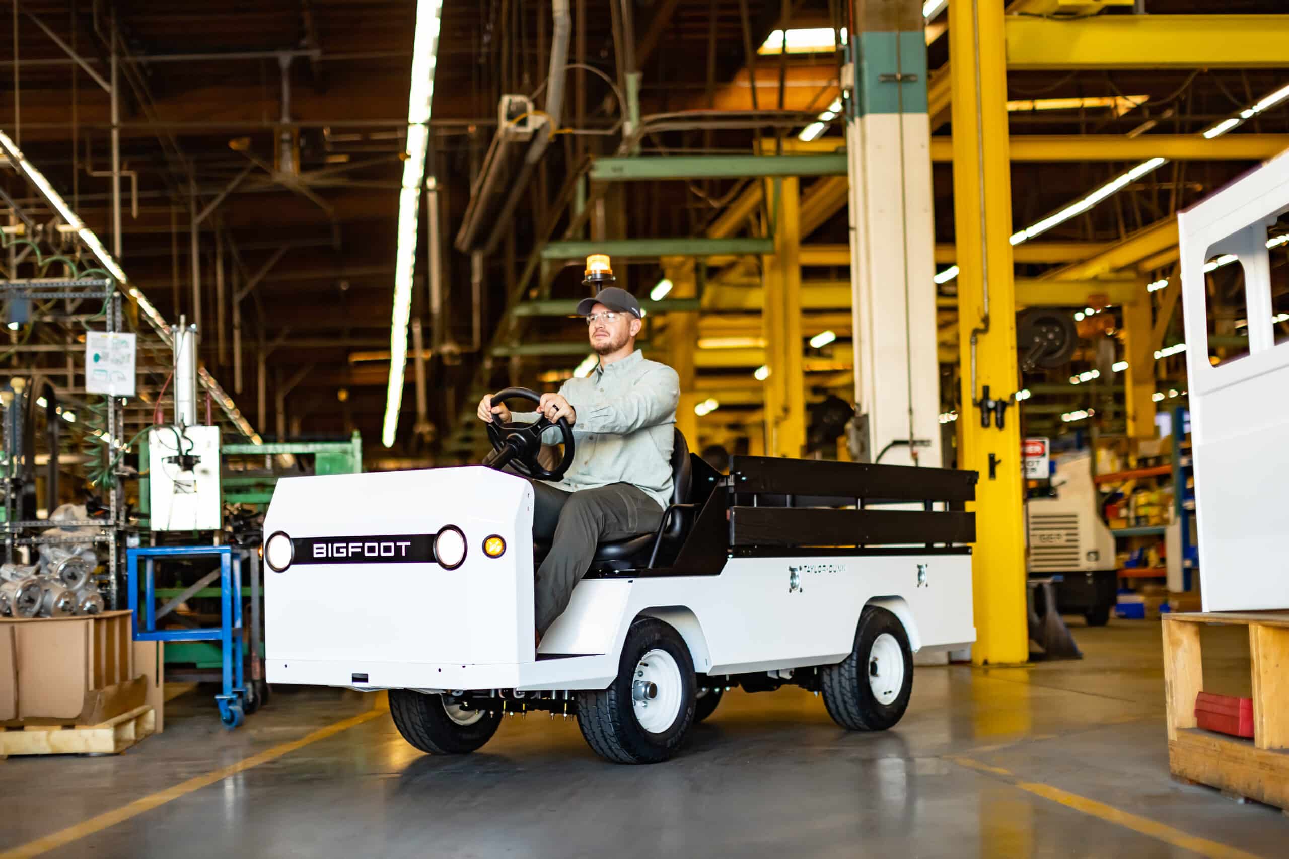 Taylor-Dunn-Bigfoot-S-with-operator-Manufacturing-Factory-Beauty-Edited-Selects-07