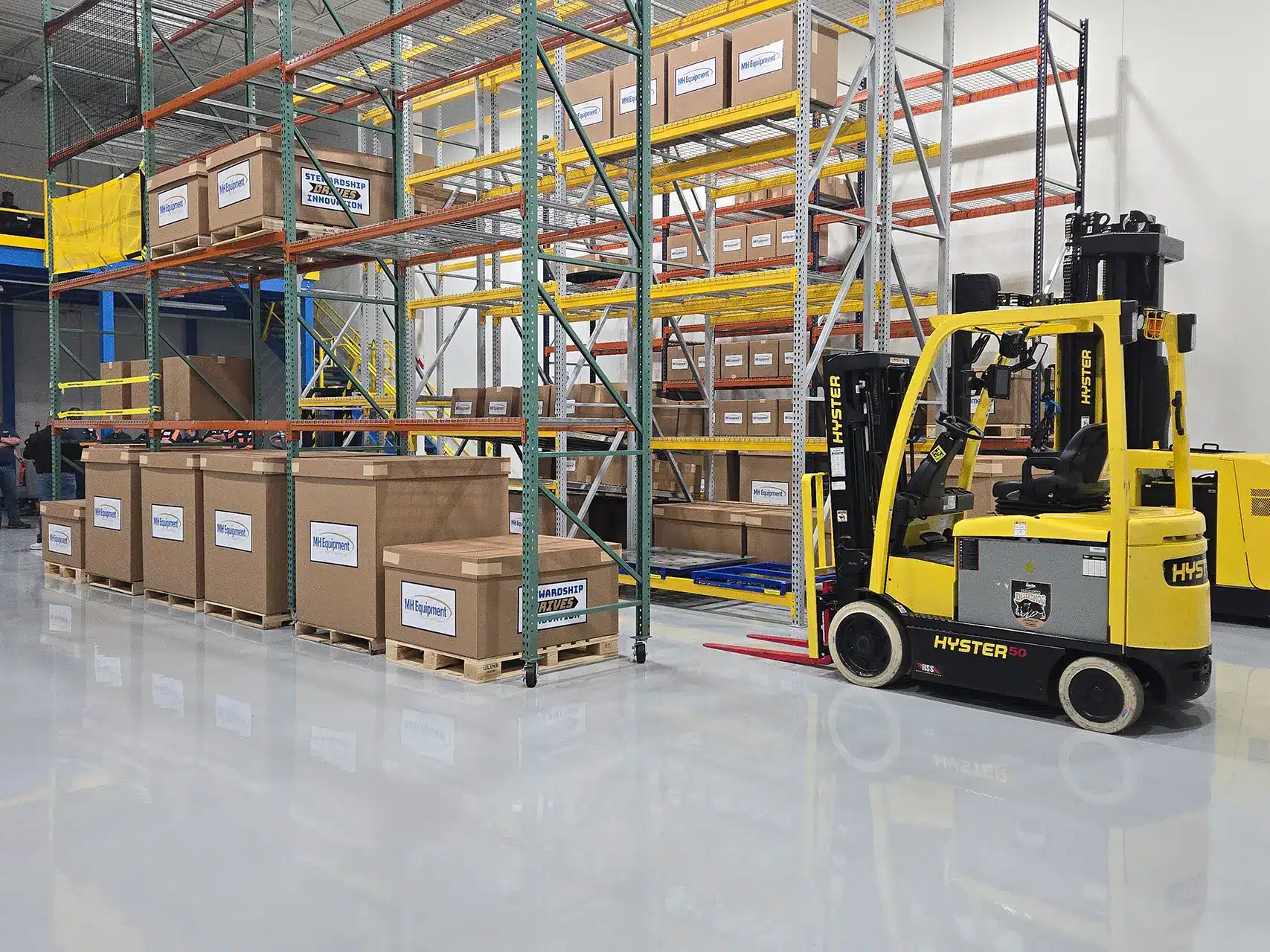 Warehouse Innovation Center with two Hyster lift trucks